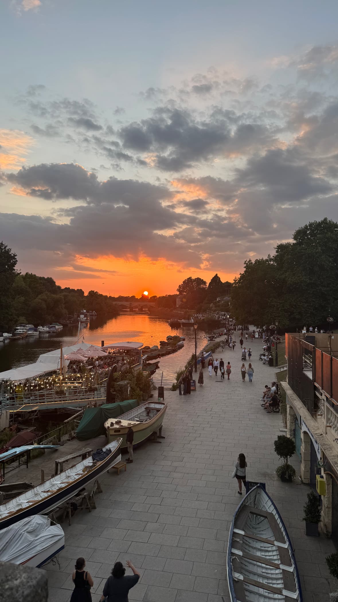 Walking along Tames at sunset
